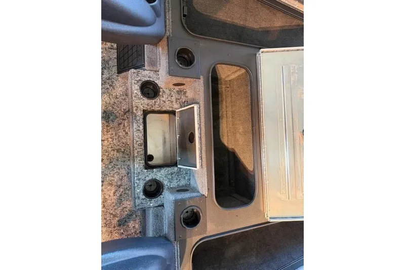 Slide: The Image of Interior view of 2026 Tracker Pro Team 195 boat storage compartments. - 11