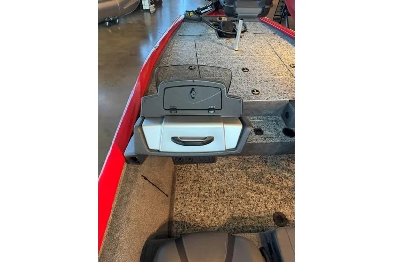 Slide: The Image of 2026 Tracker Pro Team 195 boat interior with storage compartment open. - 9