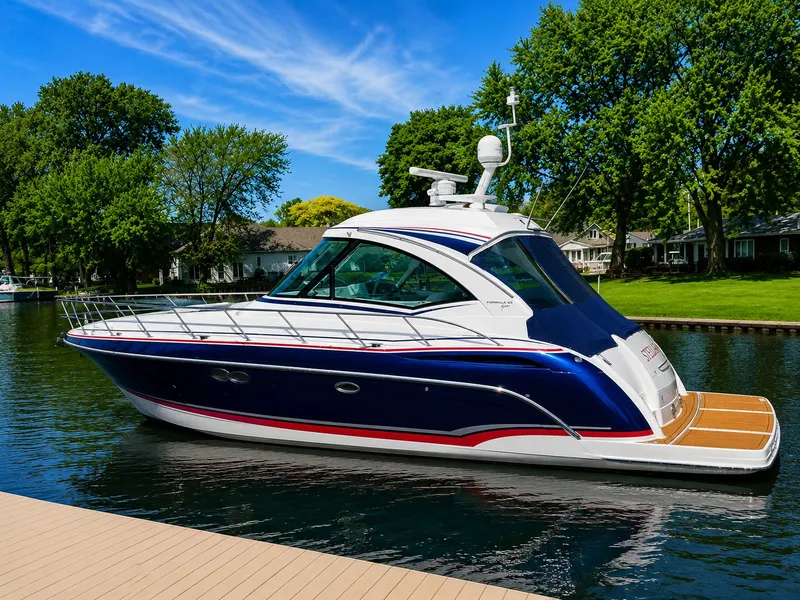 The Image of 2011 Formula 45 Yacht on calm water, surrounded by trees. - 0