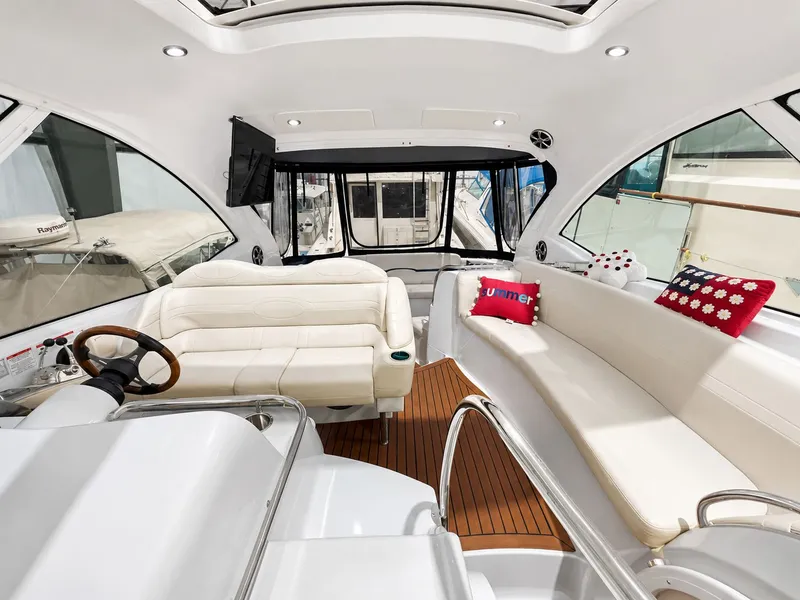 Slide: The Image of Interior of a 2011 Formula 45 Yacht with elegant white seating. - 5