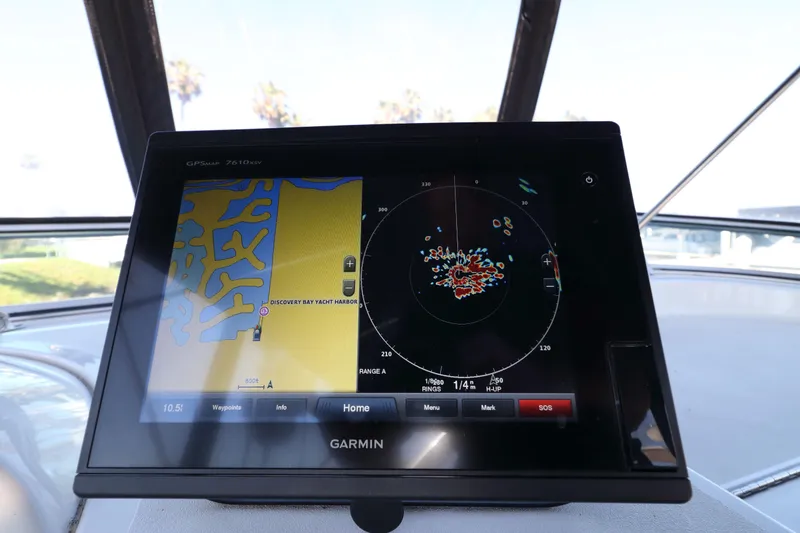 Slide: The Image of Garmin GPS display on 1999 Bayliner 3988 Command Bridge Motoryacht, showing navigation and radar. - 17