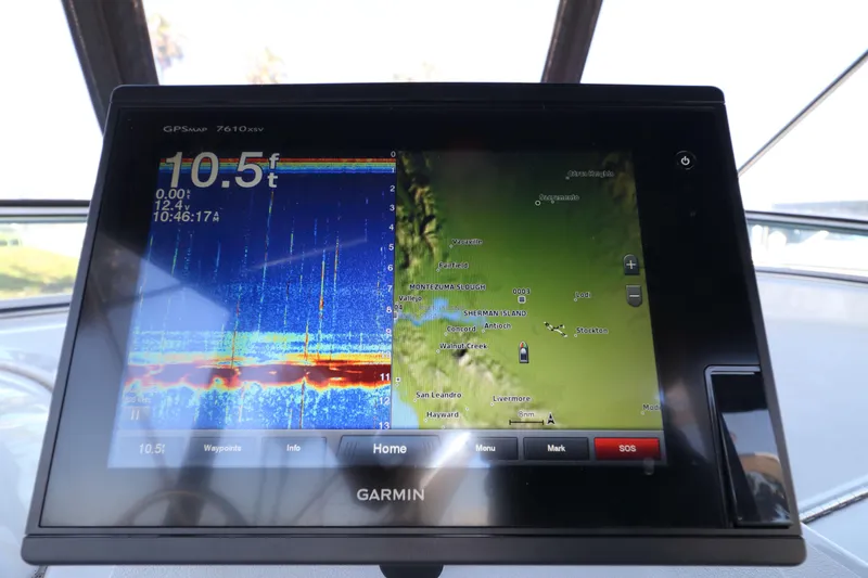 Slide: The Image of Garmin GPS display on 1999 Bayliner 3988 Command Bridge Motoryacht showing depth and map. - 18