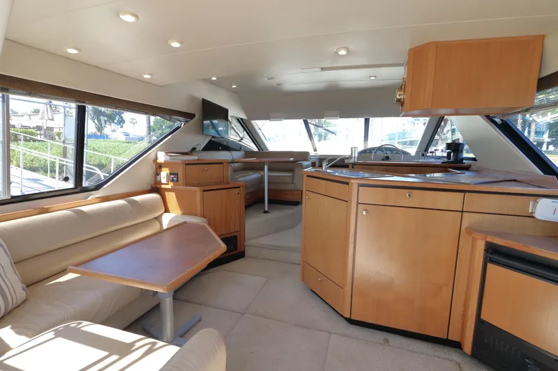 Slide: The Image of Luxurious interior of 1999 Bayliner 3988 Command Bridge Motoryacht with modern amenities. - 21