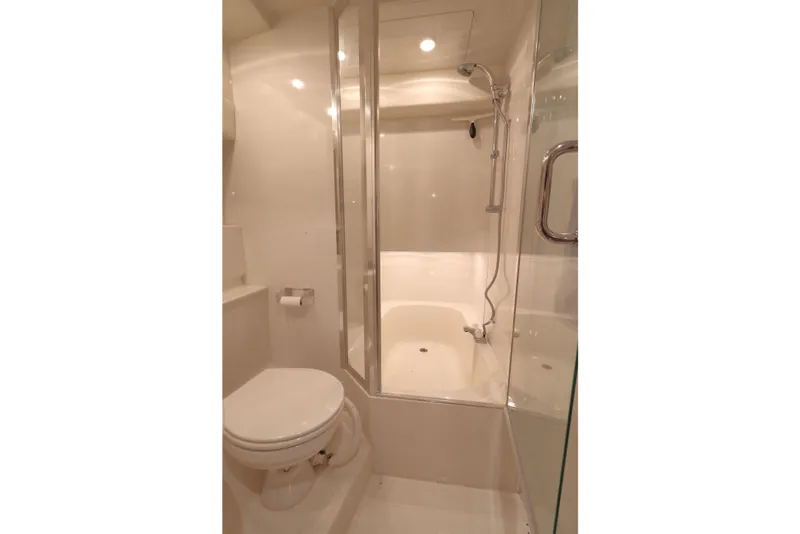 Slide: The Image of Bathroom interior of 1999 Bayliner 3988 Command Bridge Motoryacht with shower and toilet. - 44
