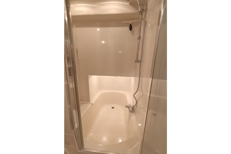 Slide: The Image of Shower area in 1999 Bayliner 3988 Command Bridge Motoryacht, featuring sleek design and modern fixtures. - 45