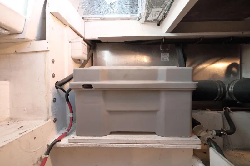 Slide: The Image of Battery compartment in a 1999 Bayliner 3988 Command Bridge Motoryacht engine room. - 55