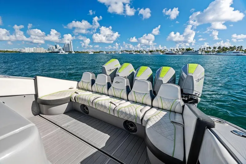 Slide: The Image of 2022 Midnight Express 43' Solstice boat with powerful engines on a sunny day. - 29