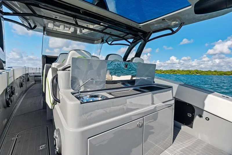 Slide: The Image of 2022 Midnight Express 43' Solstice luxury boat interior with sleek design and ocean view. - 33
