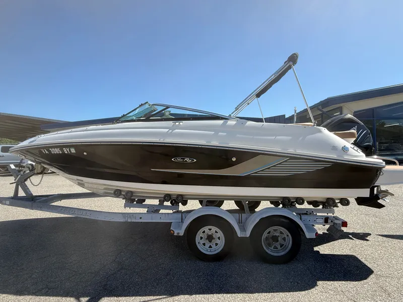 Slide: The Image of 2015 Sea Ray 220 Sundeck OB on trailer, side view. - 4