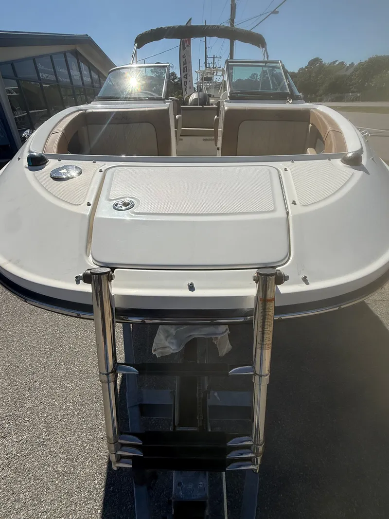 Slide: The Image of 2015 Sea Ray 220 Sundeck OB with swim ladder. - 6
