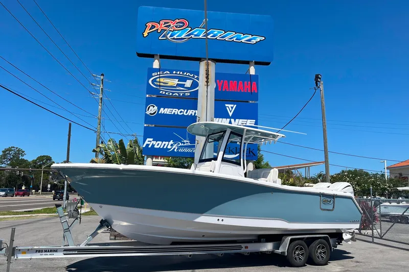 The Image of 2026 Sea Hunt Ultra 275 Coffin Box boat on trailer at Pro Marine dealership. - 0