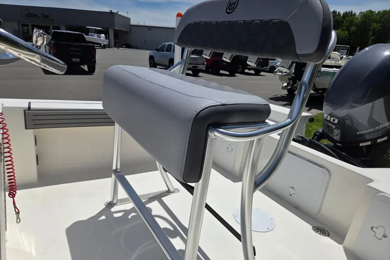 Slide: The Image of 2026 May-Craft 182 Center Console boat seat and console detail in a sunny outdoor setting. - 12