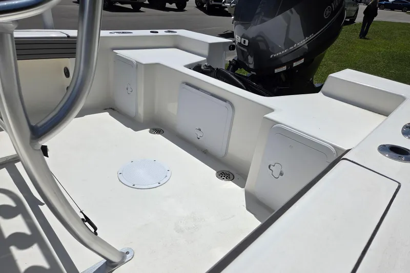 Slide: The Image of 2026 May-Craft 182 Center Console boat interior with Yamaha outboard motor. - 13