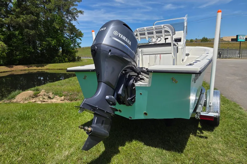 Slide: The Image of 2026 May-Craft 182 Center Console boat with Yamaha outboard motor on trailer. - 3