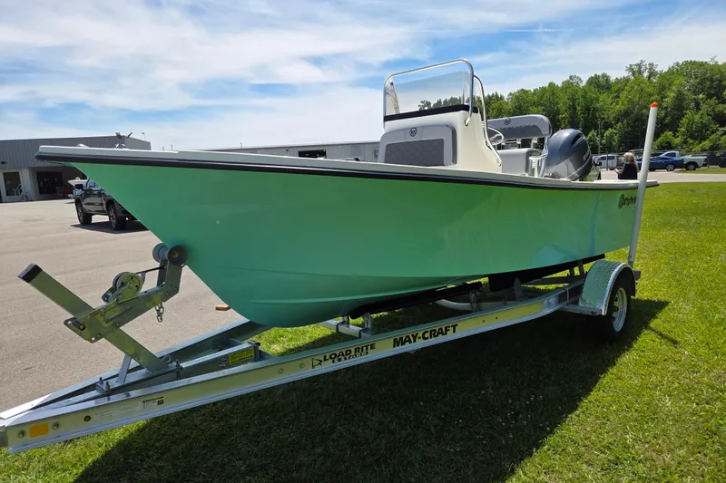 Slide: The Image of 2026 May-Craft 182 Center Console boat on trailer, parked on grass. - 7