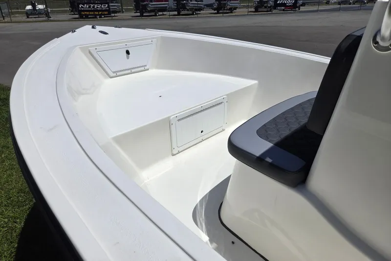 Slide: The Image of 2026 May-Craft 182 Center Console boat interior with seating and storage compartments. - 8