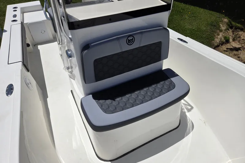 Slide: The Image of 2026 May-Craft 182 Center Console boat interior with cushioned seating and sleek design. - 9