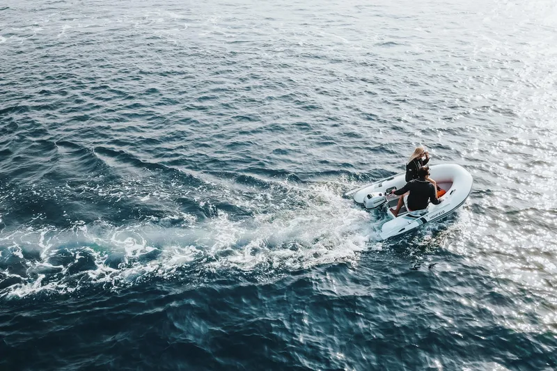 Slide: The Image of 2026 Highfield Ultralite 240 inflatable boat cruising on open water. - 8
