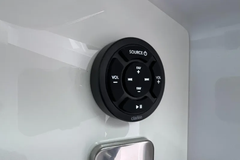 Slide: The Image of Audio control panel on 2025 Axopar 37 Sun-Top boat interior. - 36