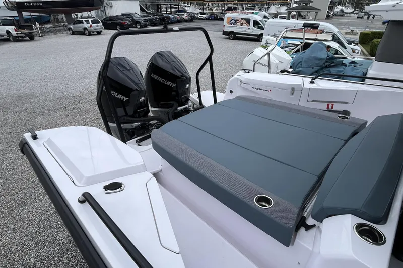 Slide: The Image of 2025 Axopar 37 Sun-Top with dual Mercury engines, docked in a marina. - 50