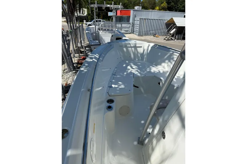 Slide: The Image of 2006 Sailfish 218 CC boat interior, featuring spacious seating and sleek design. - 4