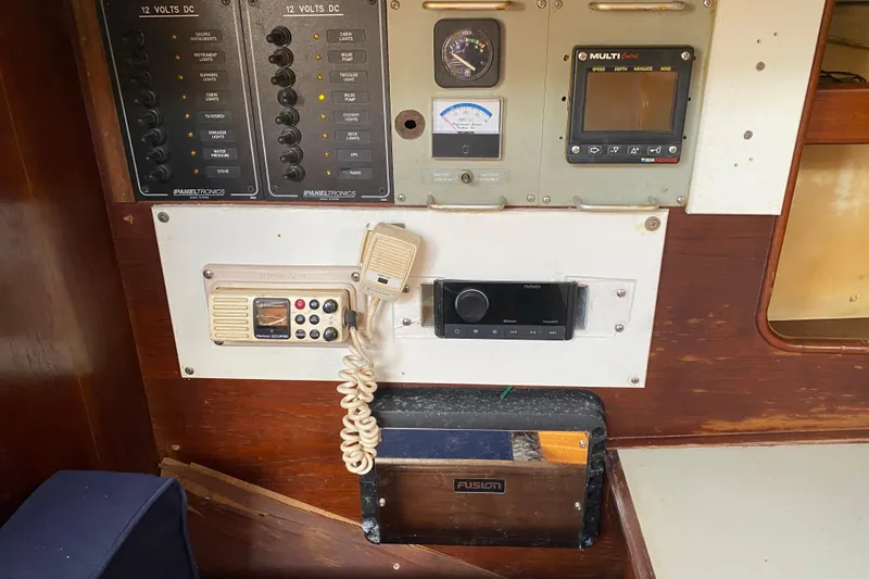 Slide: The Image of Control panel of a 1981 C&C 40 sailboat with navigation and communication equipment. - 35