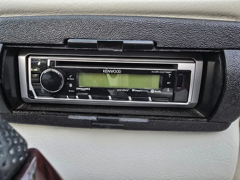 Slide: The Image of Kenwood car stereo in a 2000 Mariah 20 Shabah dashboard, featuring modern connectivity options. - 11