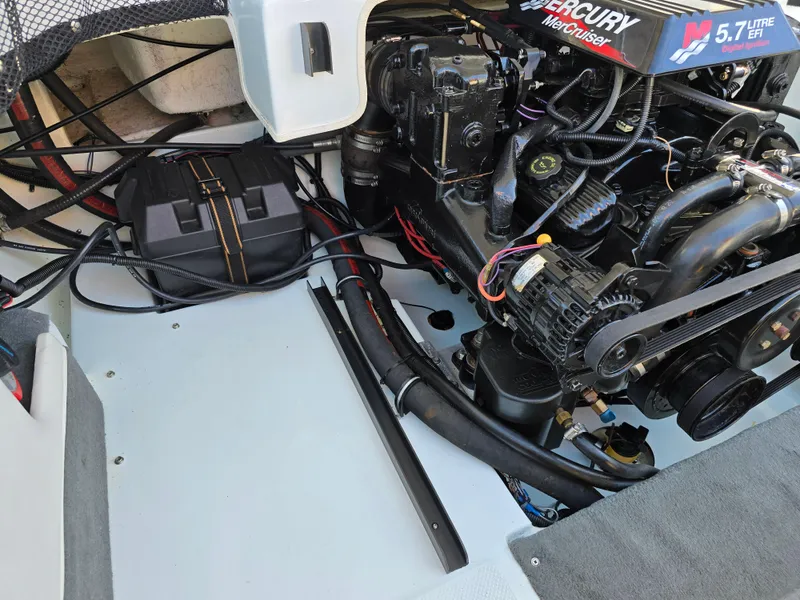 Slide: The Image of Engine compartment of a 2000 Mariah 20 Shabah boat with Mercury 5.7L engine. - 17