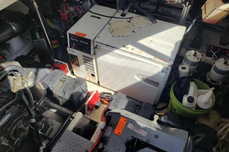 Slide: The Image of Engine room of 2004 Cruisers Yachts 400 Express with Onan Marine Genset. - 50