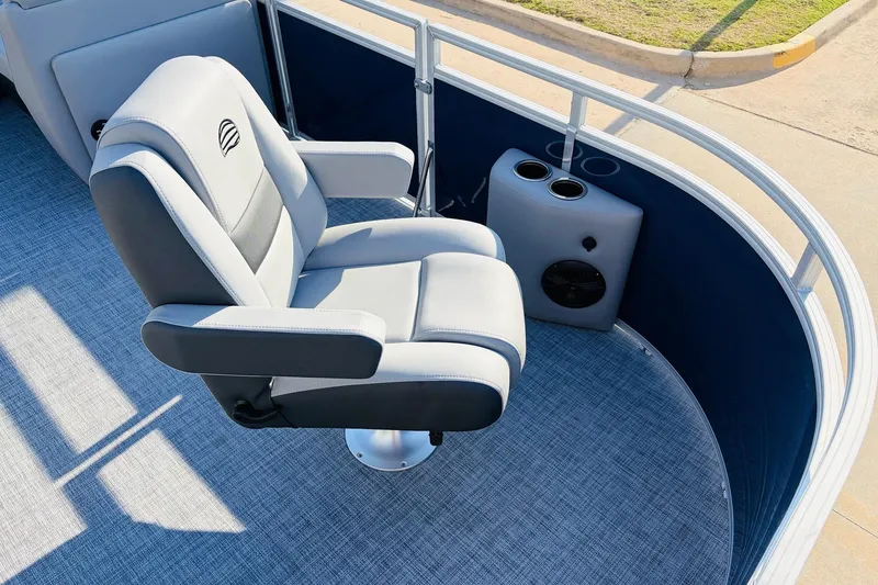 Slide: The Image of 2026 Sun Tracker SportFish 20 DLX boat seat with cup holders and speaker. - 14