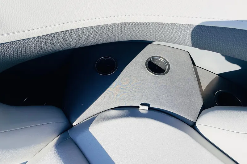 Slide: The Image of Interior seating of 2026 Sun Tracker SportFish 20 DLX boat with cup holders. - 21