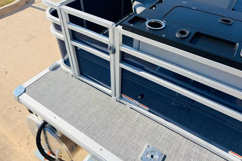 Slide: The Image of 2026 Sun Tracker SportFish 20 DLX pontoon boat deck and railing detail. - 47