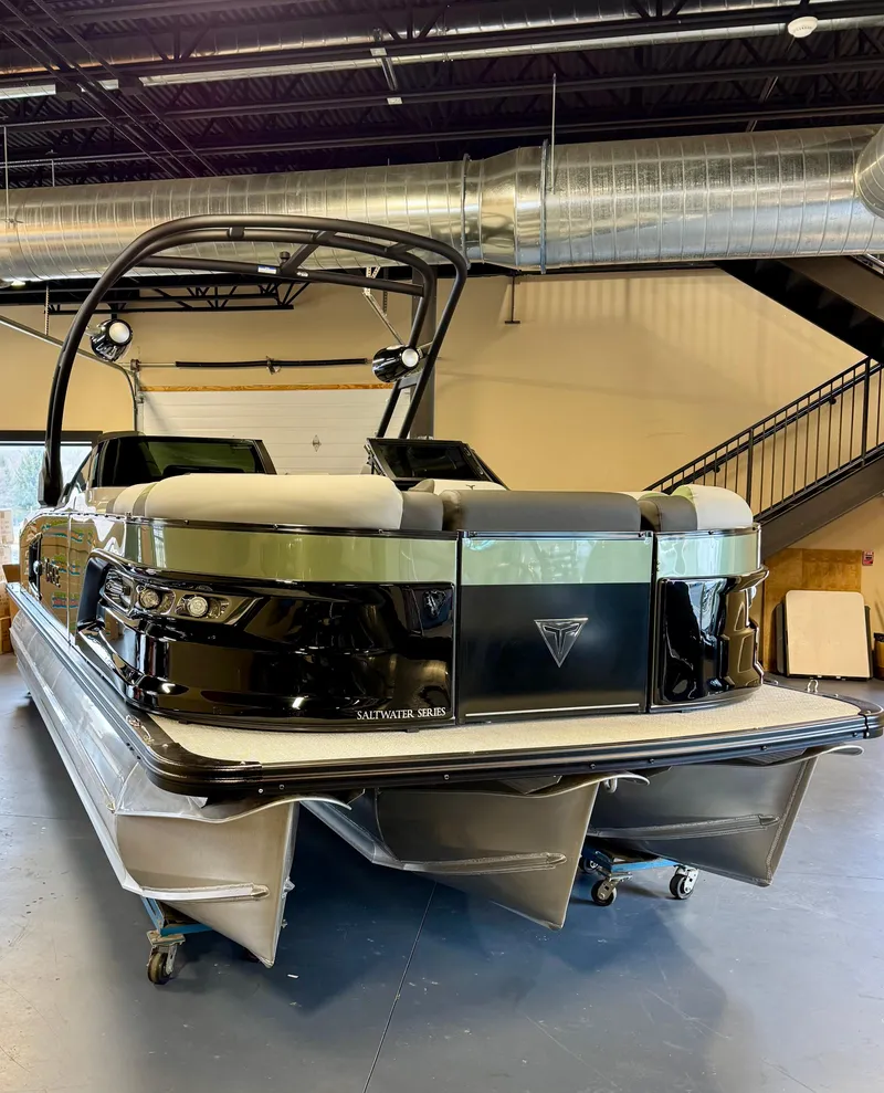 Slide: The Image of 2025 Tahoe Pontoon Grand Tahoe LTD Versatile Rear Bench Windshield in showroom. - 1