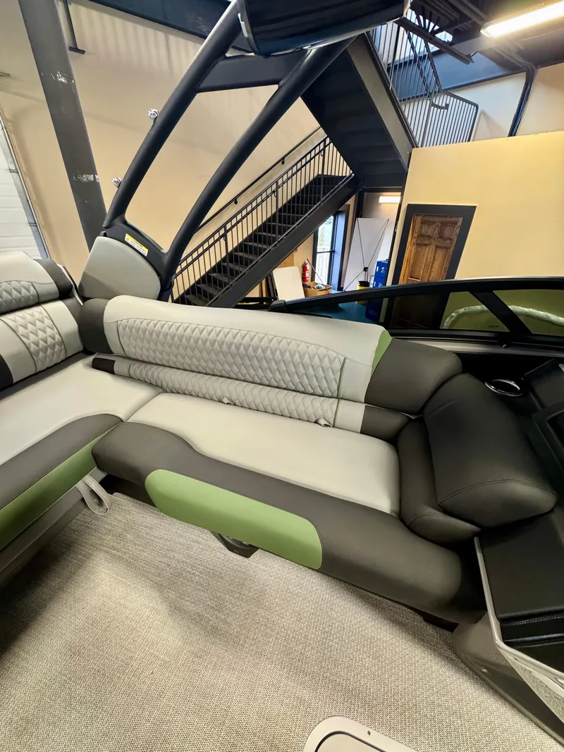 Slide: The Image of 2025 Tahoe Pontoon Grand Tahoe LTD Versatile Rear Bench Windshield interior with modern seating design. - 5