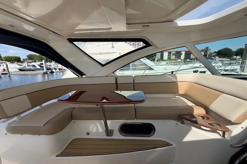 Slide: The Image of Luxurious interior of 2013 Tiara Yachts 3600 Coronet with elegant seating and table. - 17