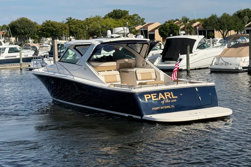 Slide: The Image of 2013 Tiara Yachts 3600 Coronet named "Pearl" docked in Fort Myers marina. - 3