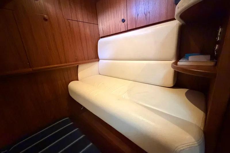 Slide: The Image of Luxurious interior seating of 2013 Tiara Yachts 3600 Coronet with wooden paneling. - 40