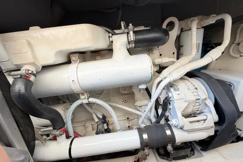 Slide: The Image of Engine compartment of a 2013 Tiara Yachts 3600 Coronet, showcasing mechanical components. - 53