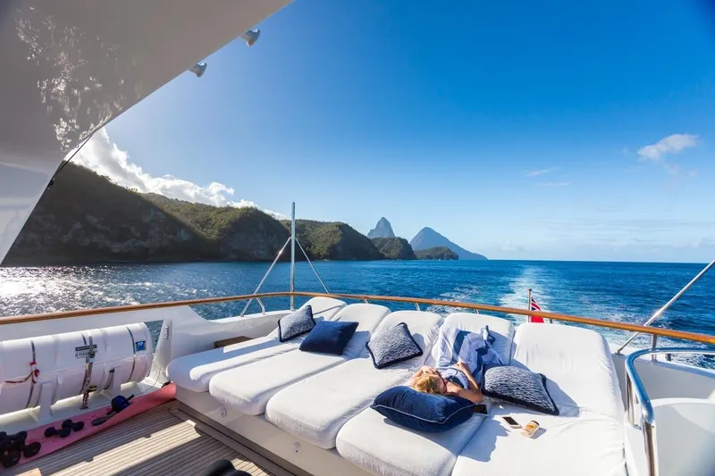 Slide: The Image of Luxurious Palmer Johnson yacht cruising with scenic ocean and mountain views, 1997 model. - 20