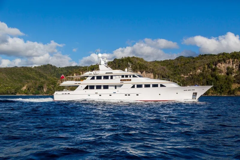 Slide: The Image of Luxurious 1997 Palmer Johnson Semi-Displacement yacht cruising in scenic waters. - 26