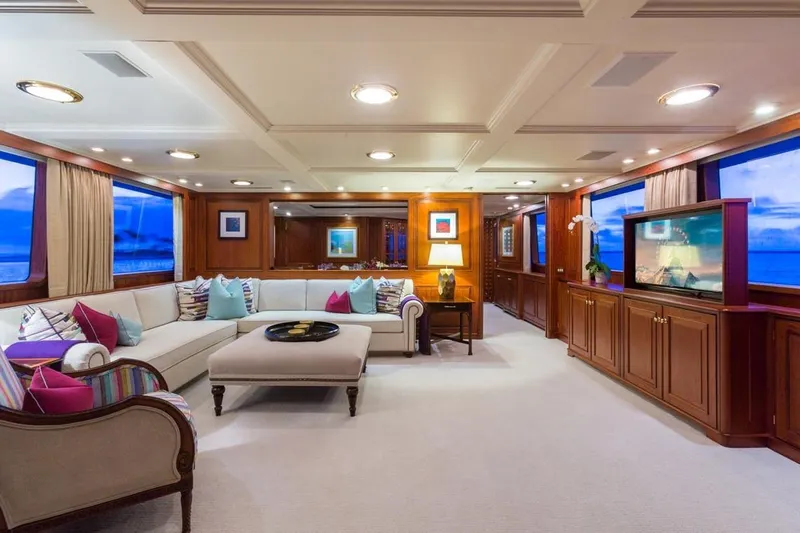 Slide: The Image of Luxurious 1997 Palmer Johnson yacht interior with elegant seating, large windows, and stylish decor. - 3