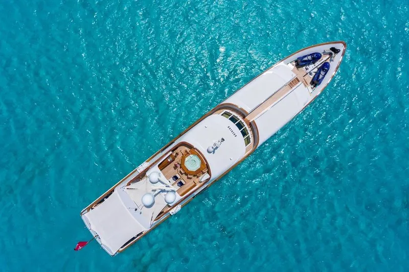 Slide: The Image of Aerial view of 1997 Palmer Johnson Semi-Displacement yacht on turquoise water. - 30
