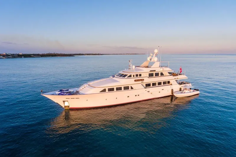 Slide: The Image of Luxurious 1997 Palmer Johnson Semi-Displacement yacht cruising on serene blue waters at sunset. - 33