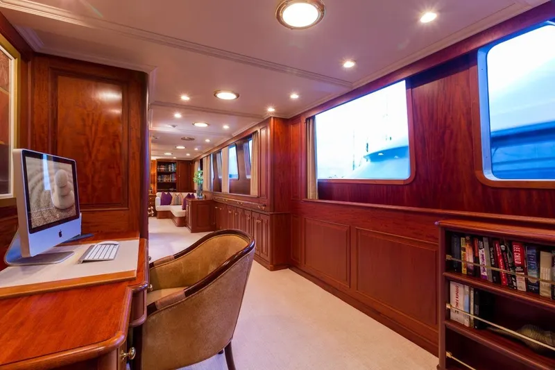 Slide: The Image of Luxurious interior of 1997 Palmer Johnson yacht with wood paneling and modern amenities. - 7