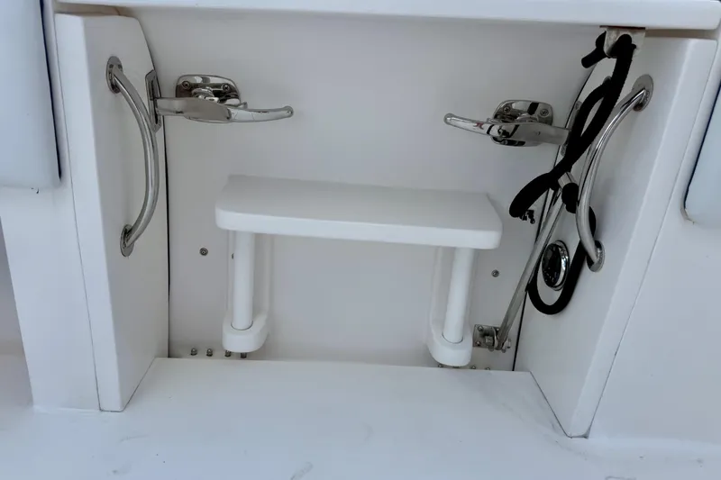 Slide: The Image of 2013 Intrepid 430 Sport Yacht swim platform with stainless steel handles and step. - 12
