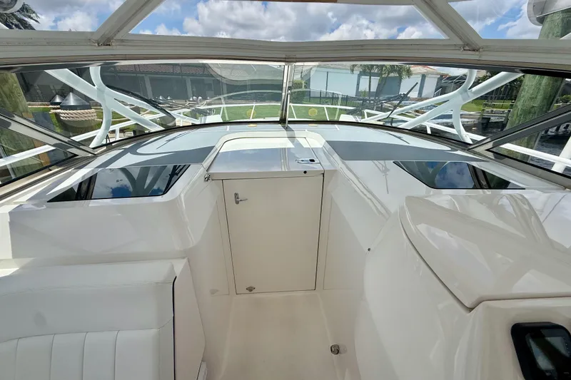 Slide: The Image of 2013 Intrepid 430 Sport Yacht cockpit with sleek design and panoramic views. - 27