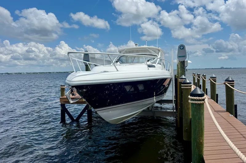 Slide: The Image of Intrepid 430 Sport Yacht 2013 docked on a sunny day with blue skies. - 3
