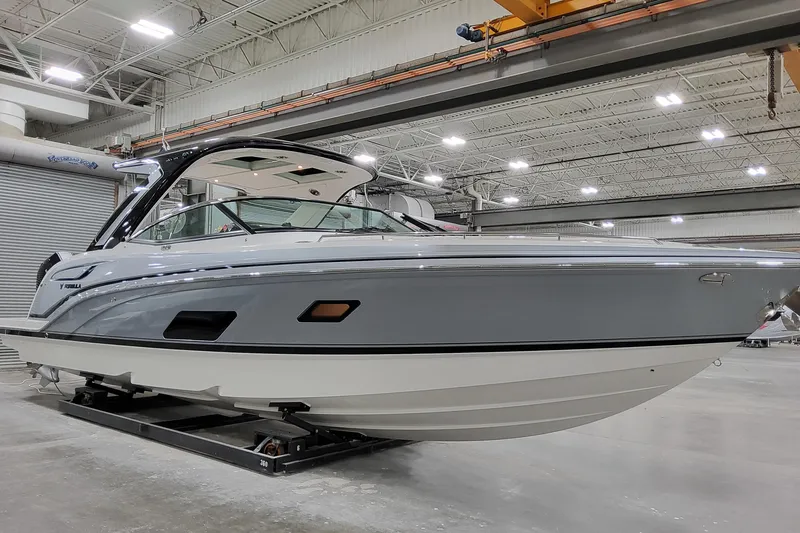 The Image of 2026 Formula 360 Crossover Bowrider OB in a showroom, showcasing sleek design and modern features. - 1