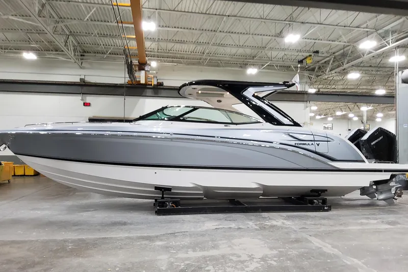 Slide: The Image of 2026 Formula 360 Crossover Bowrider OB in a showroom, showcasing sleek design and modern features. - 3