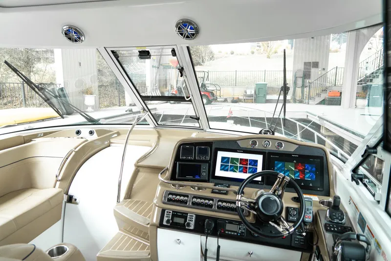 Slide: The Image of Interior view of 2016 Formula 45 Yacht cockpit with advanced navigation systems. - 18